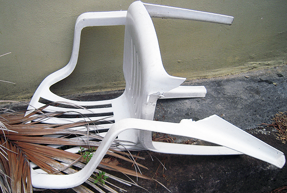 A dead stacking chair